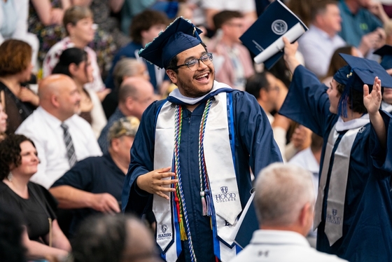 A student wearing regalia at Commencement 2026.