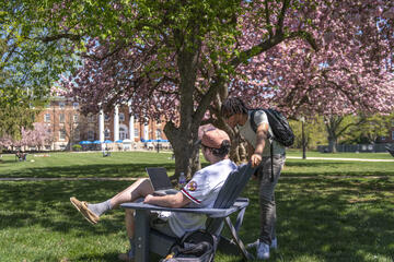 Two students on the quad