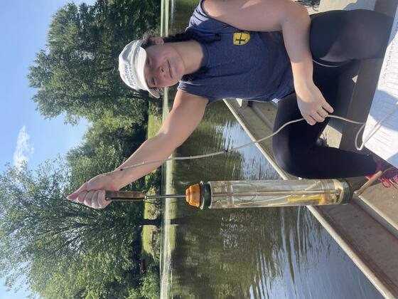 Christina Shaner '24 collecting water samples throughout the water column on Lake Anita-Louise.