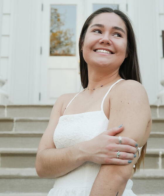Dorian Young on the steps of Rosenstock Hall