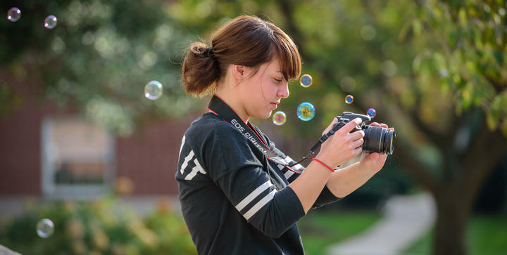 Student taking photos